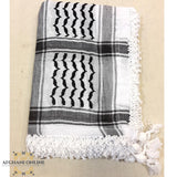 Palestinian keffiyeh - Kuffiyah scarf in United kingdom - Keffiyeh in USA - Arabic scarf from Palestine - kufīyah - ghutrah - shemagh - hattah - traditional Middle Eastern headdress - Amman Jordan souvenirs - Afghani online - shop from Palestine - حطة فلسطينية - شماغ فلسطيني