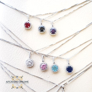 Garnet ( red ), black zircon, Amethyst ( violet ), crystal ( white ) Rose ( pink ), Aqua blue ( light blue ), Tanzanite ( navy blue )