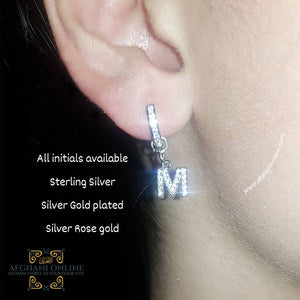 Silver initials earrings - hoop letter earrings - best jewellery in Amman - gifts for her - luxury Earrings set - fashion and elegance - girl in style - women's today beauty - cubic zirconia earrings - rhodium earrings - UAE earrings - Jordan earrings - Afghani online - oriental earrings - حلق حرف فضة